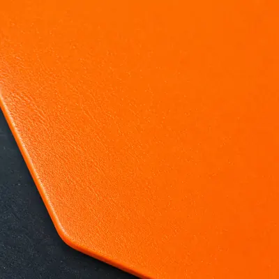 Fluorescent orange powder coating, macro