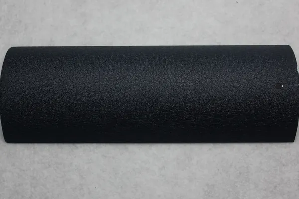 Black fine texture powder coating on an aluminium profile section