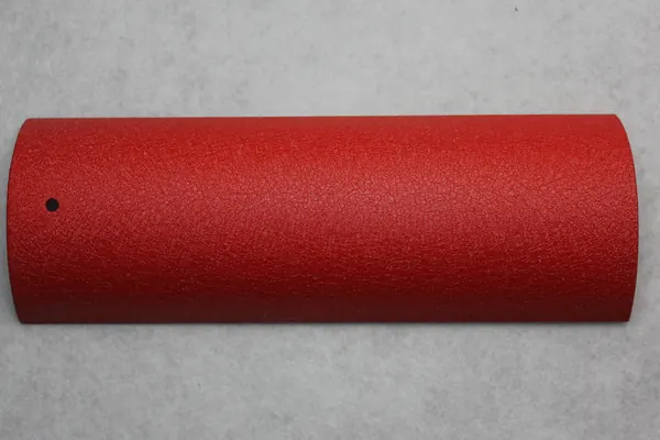 Red sand texture powder coating on an aluminium profile section