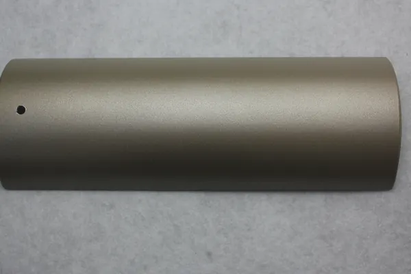 Champagne metallic powder coating on an aluminium profile section