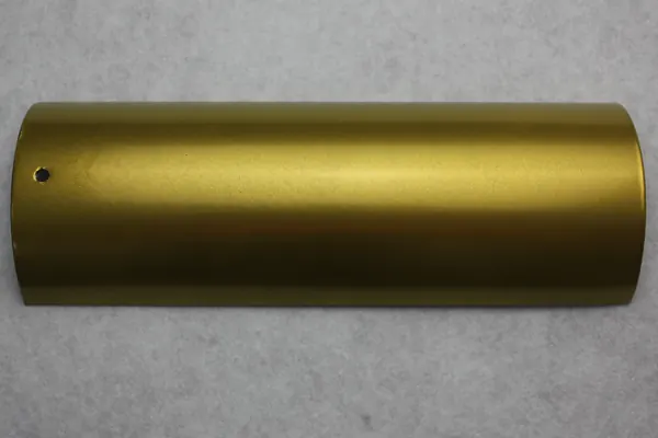 Gold metallic powder coating on an aluminium profile section