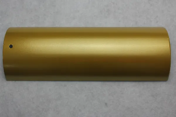 Bright gold metallic powder coating on an aluminium profile section