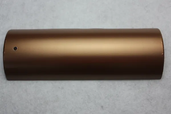 Bronze metallic powder coating on an aluminium profile section