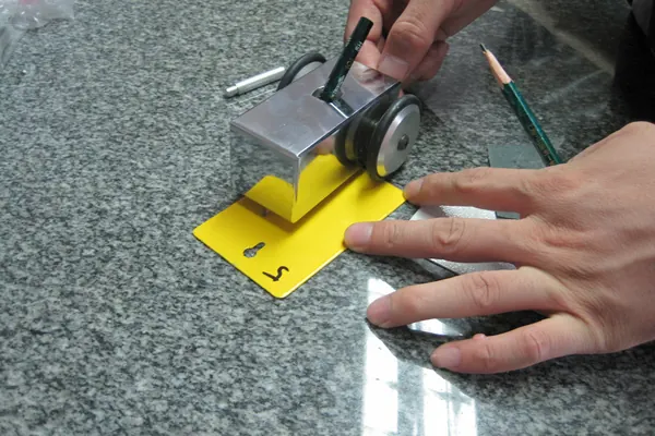 Pencil hardness test on a coated panel